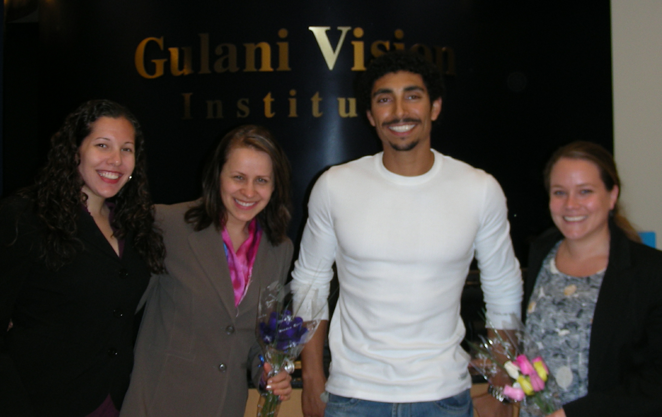 Sammy with rose for Gulani Vision Staff 