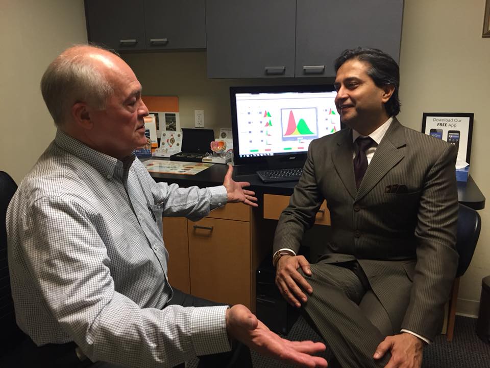 Dr. Gulani With a Patient