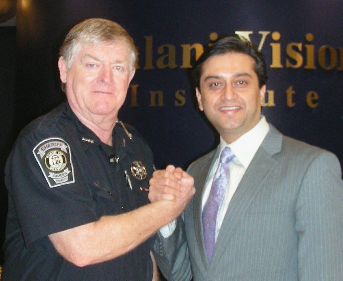 Dr. Gulani With a Patient