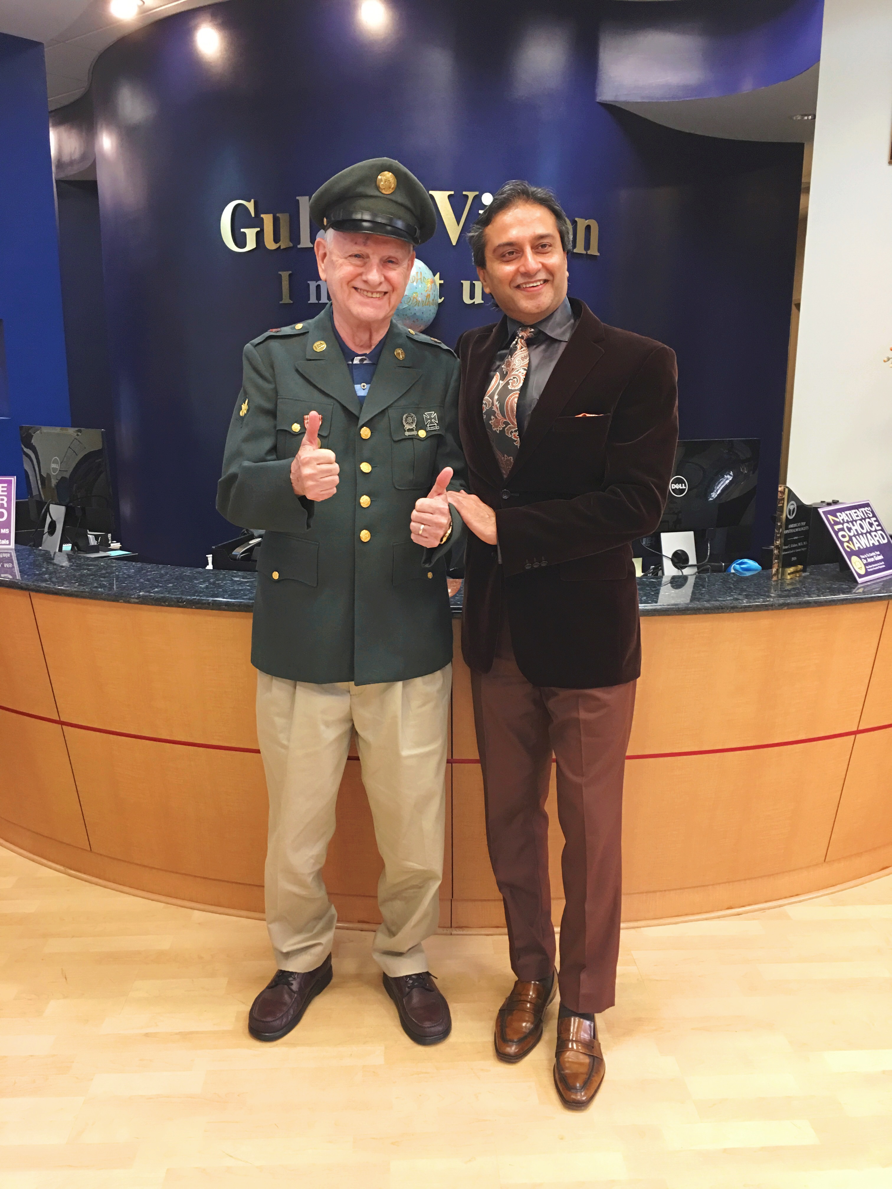 Dr. Gulani With a Veteran Patient