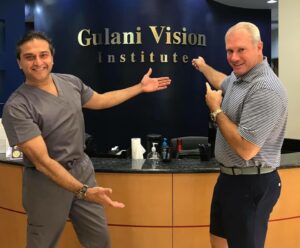 Peter V. with Dr. Gulani, celebrating 20/20 vision after successful correction of two failed LASIK surgeries