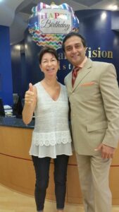 Melissa K. on Day One after surgery with Dr. Gulani, smiling after her corneal scar from LASIK was successfully corrected.
