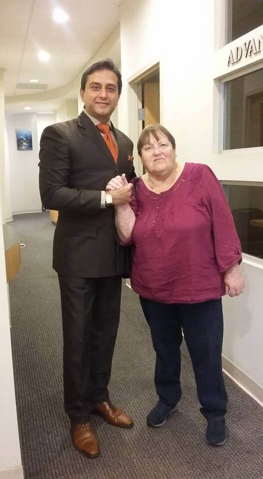 Dr. Gulani With a Patient
