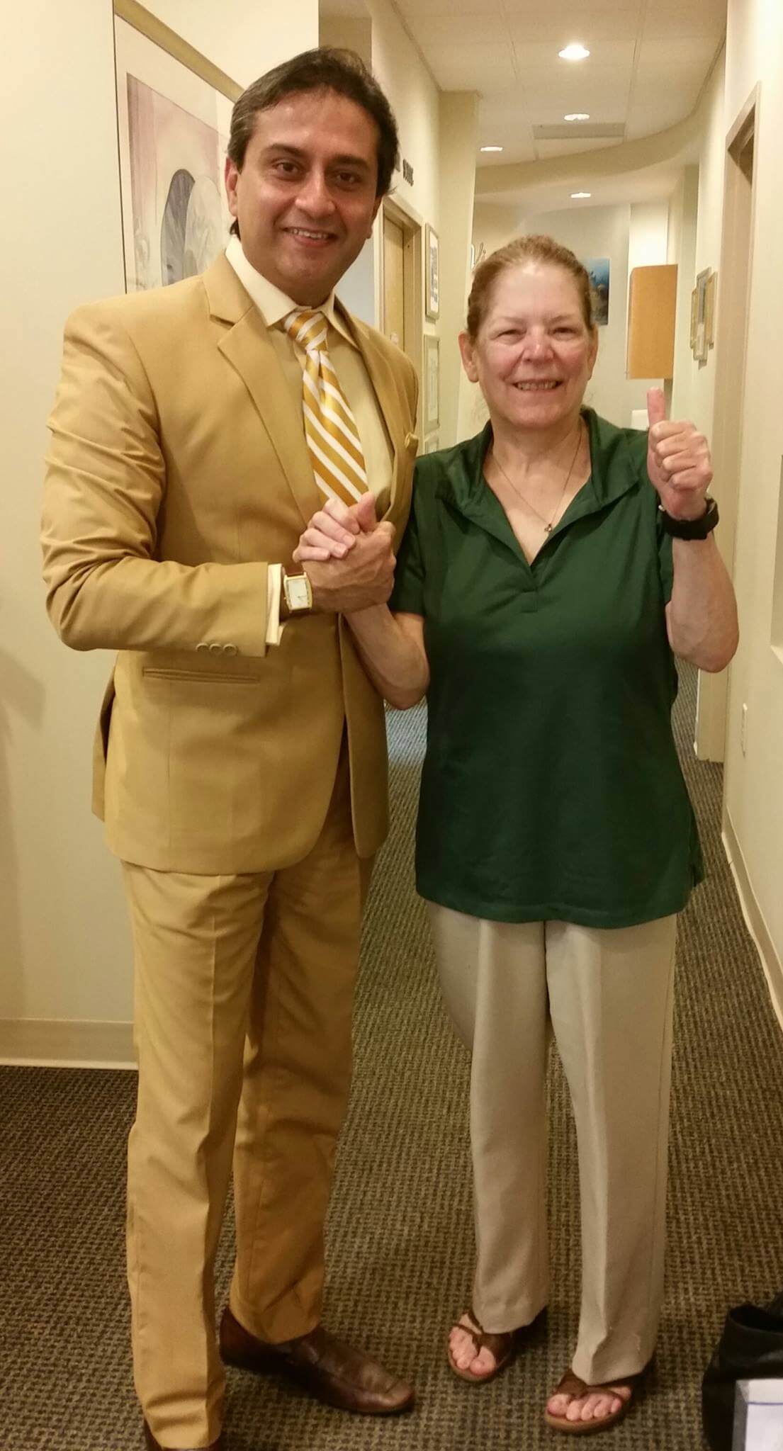 Dr. Gulani With a Patient