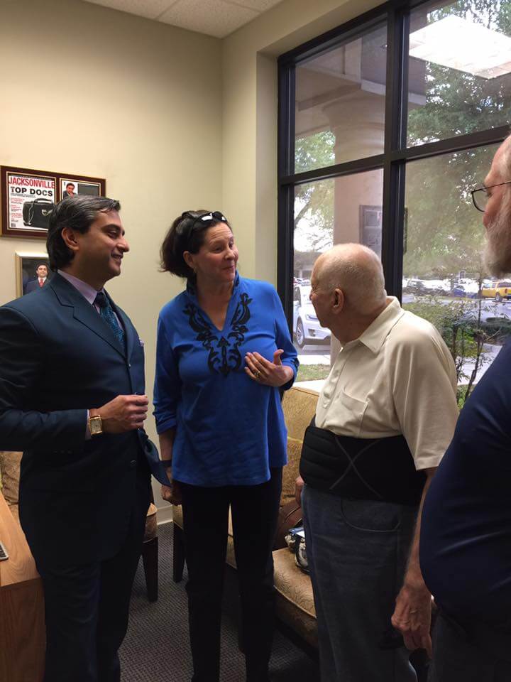 Dr. Gulani With Patients