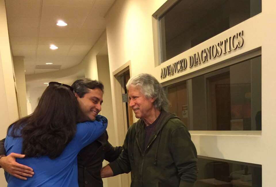 Dr. Gulani Hugging a Patient