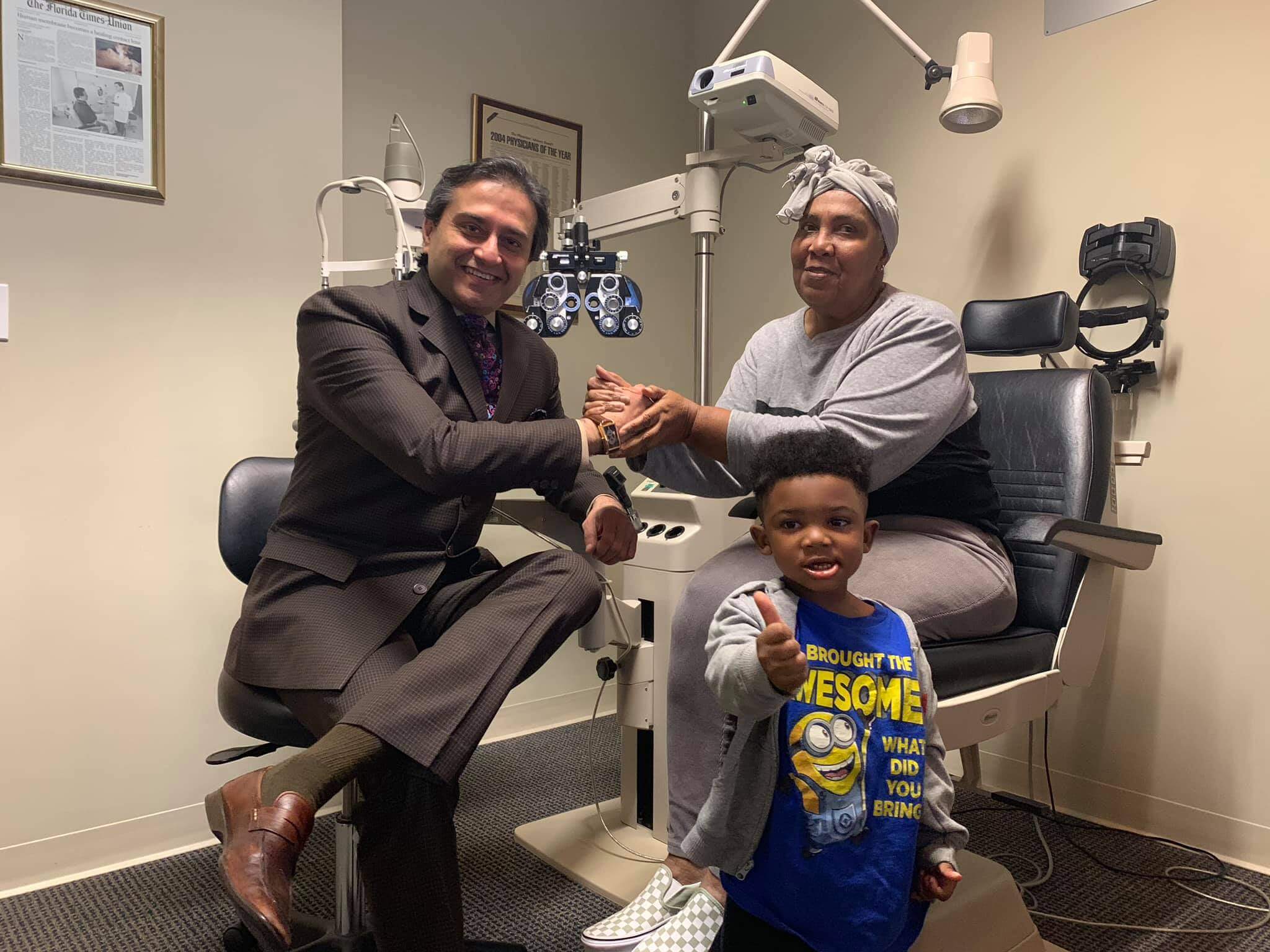 Dr. Gulani With a Patient