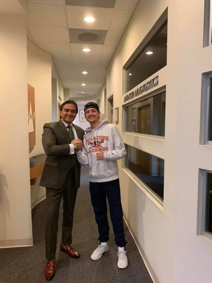 Dr. Gulani With a Patient