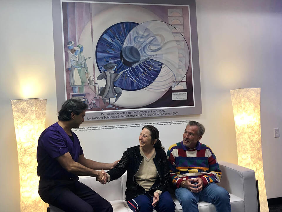 Dr. Gulani Shaking Hands With a Patient