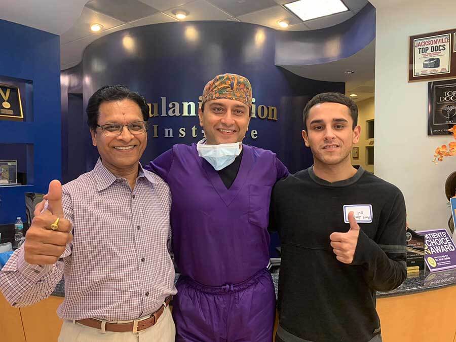 Dr. Gulani With a Patient