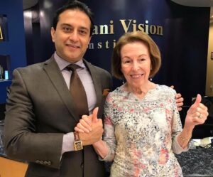Louisa G. reunited with Dr. Gulani years after her complex cataract surgery, celebrating a legacy of consistent vision care.
