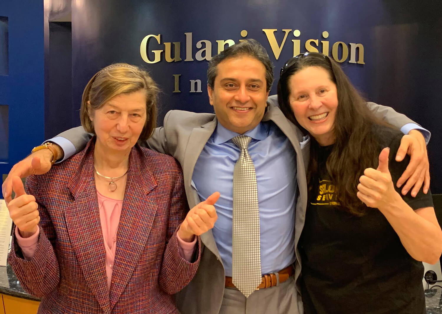 Dr. Gulani With Patients