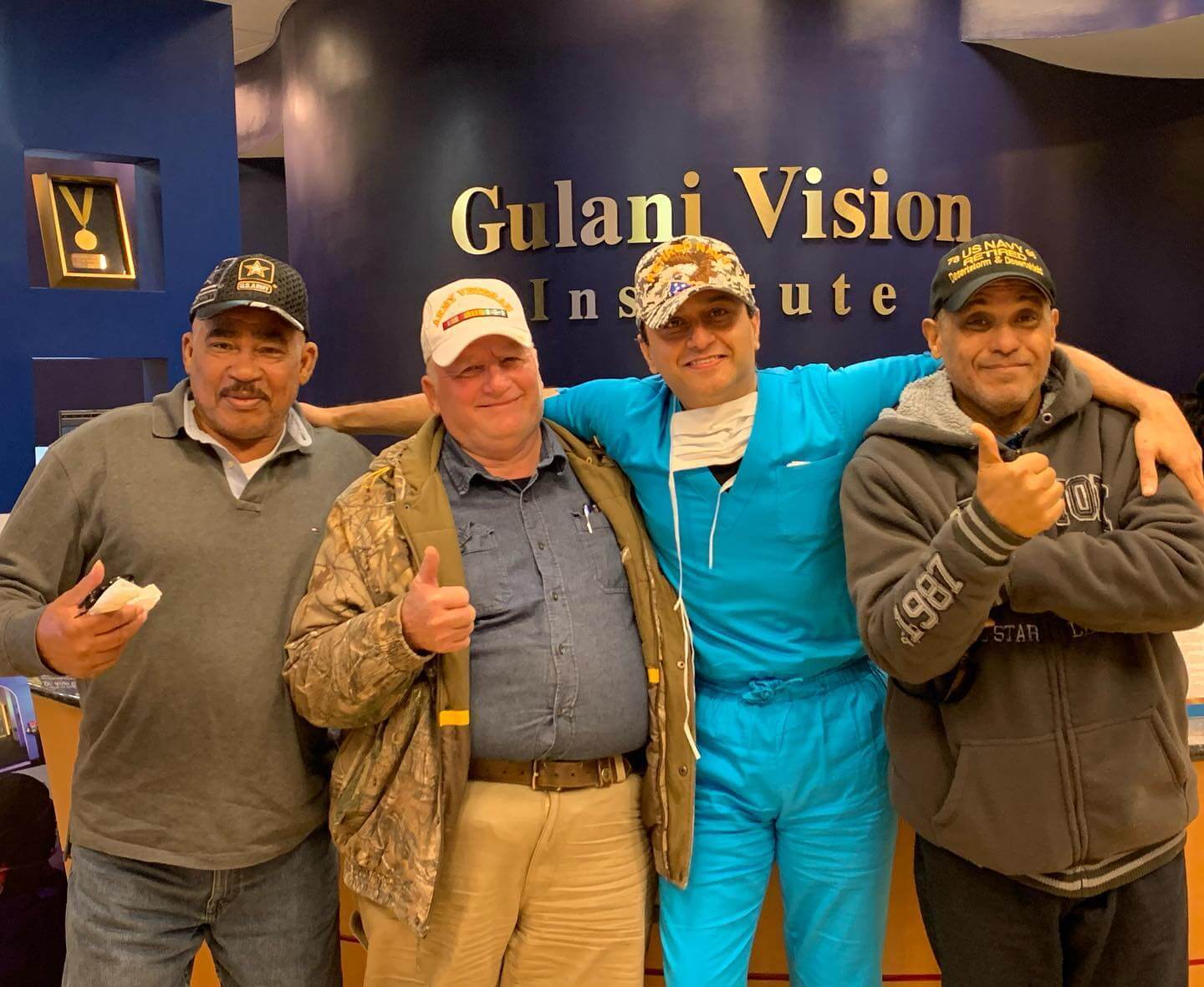 Dr. Gulani With Patients