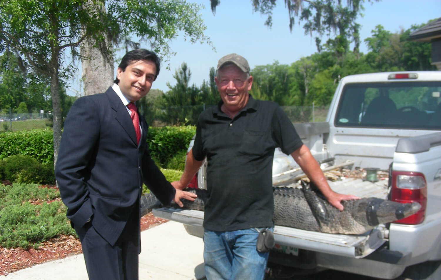 Dr. Gulani With a Patient and an Alligator