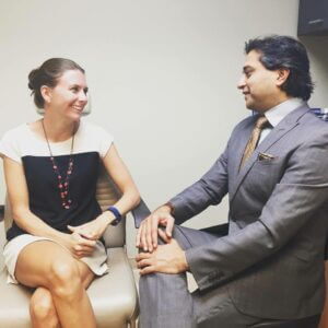 Patient at Gulani Vision Institute discussing LASIK surgery pros and cons with Dr. Arun C. Gulani during a custom vision consultation in Jacksonville, Florida.