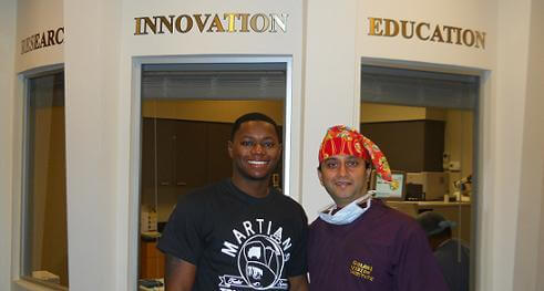 Dr. Gulani With a Patient