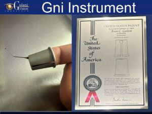 A high-tech, custom-designed surgical instrument created by Dr. Arun Gulani for use in his patented Surgical Spa. The tool features an ergonomic design, precision grip, and color-coded enhancements to optimize efficiency and accuracy in advanced eye surgeries.
