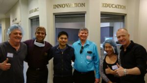 Patients from Los Angeles, China, New Jersey, and Florida celebrating restored vision with Dr. Gulani.
