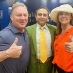 Grateful family with Dr. Gulani, celebrating vision success and emotional transformation.